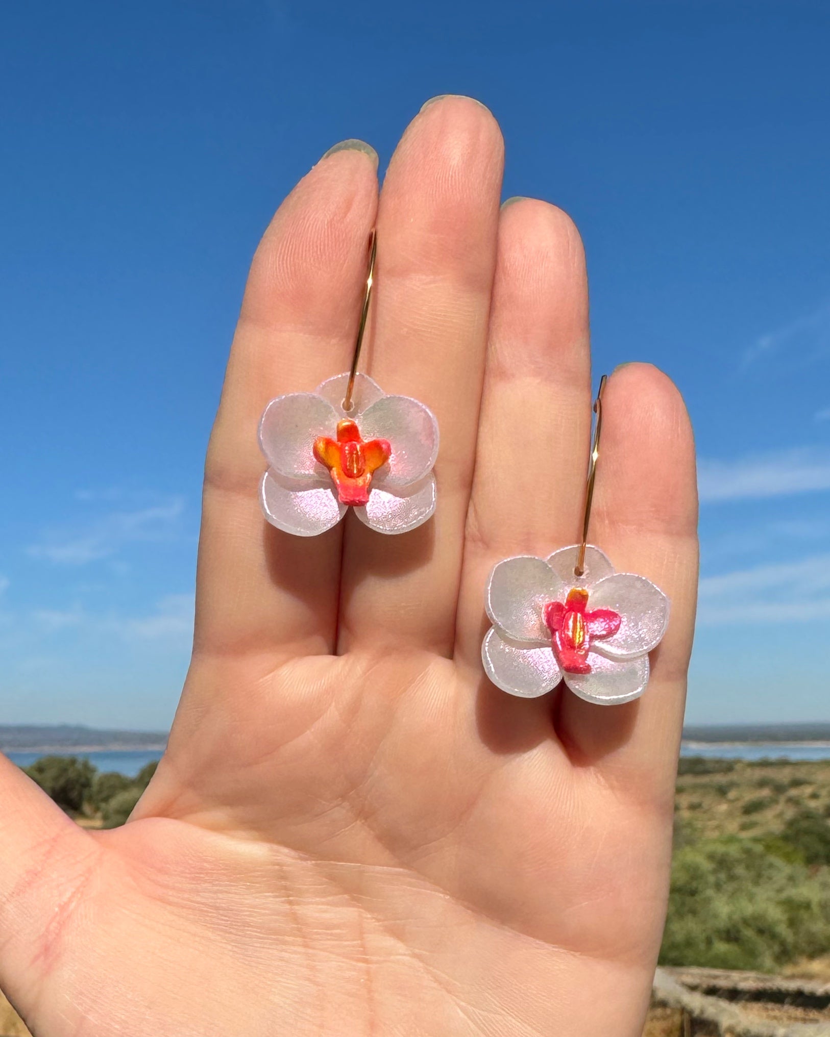 Pendientes Orquídea aro tornasol hechos a mano en arcilla polimérica